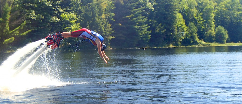 Flyboarding through the air is just one of the many FUN adventures to be had at Camp Muskoka!